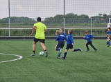 Laatste training S.K.N.W.K. JO10-1 (partijtje tegen de ouders) van woensdag 22 mei 2024 (112/133)